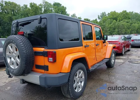 2012 Jeep Wrangler Unlimited Sahara z USA, uszkodzony, nr VIN 1C4BJWEG7CL163004